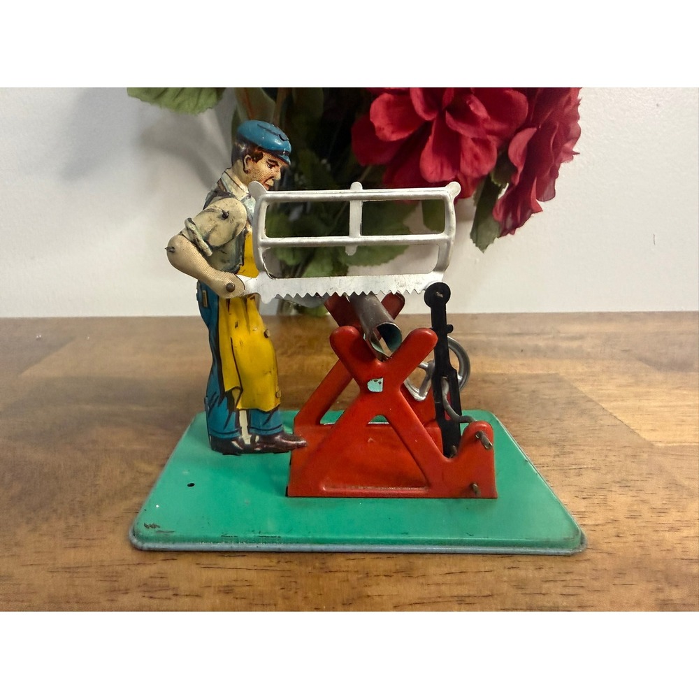 Vintage US Zone Germany Tin Lithograph Carpenter Sawing Steam Engine Toy